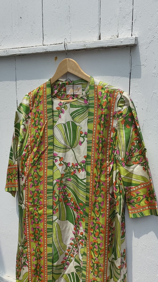 Load and play video in Gallery viewer, Rare Fashions by Marilyn Floral Maxi Dress
